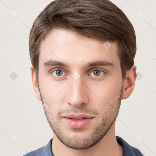 Neutral white young-adult male with short  brown hair and grey eyes