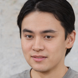 Joyful white young-adult male with medium  brown hair and brown eyes