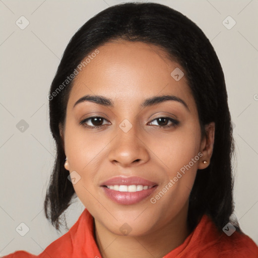 Joyful latino young-adult female with long  black hair and brown eyes