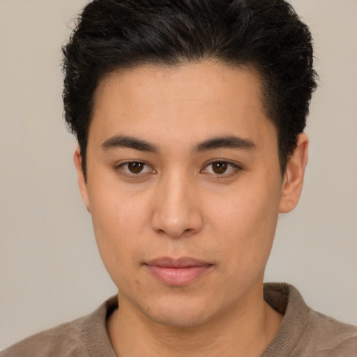 Neutral latino young-adult male with short  brown hair and brown eyes