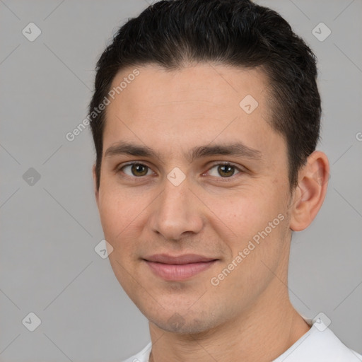 Joyful white young-adult male with short  brown hair and brown eyes