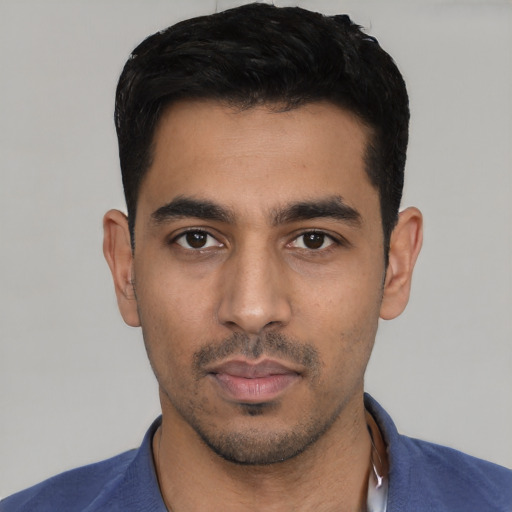 Neutral latino young-adult male with short  black hair and brown eyes