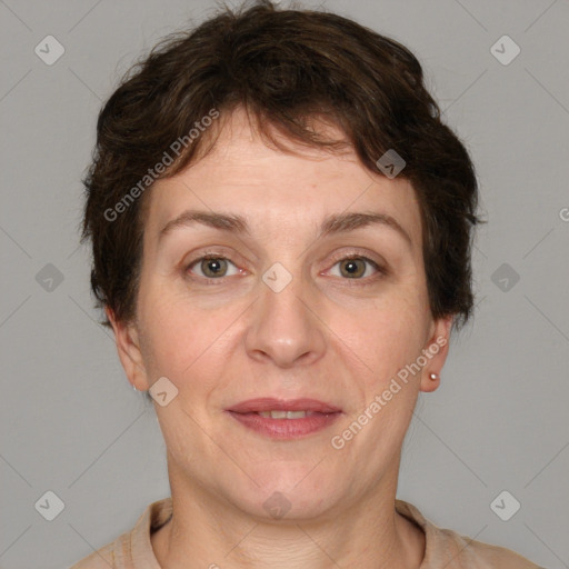 Joyful white adult female with short  brown hair and grey eyes