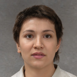 Neutral white young-adult female with short  brown hair and brown eyes