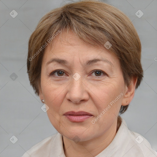 Joyful white adult female with medium  brown hair and brown eyes