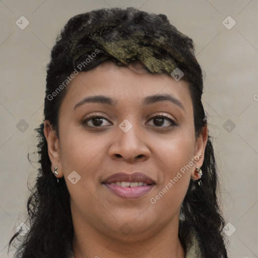 Joyful black young-adult female with long  brown hair and brown eyes