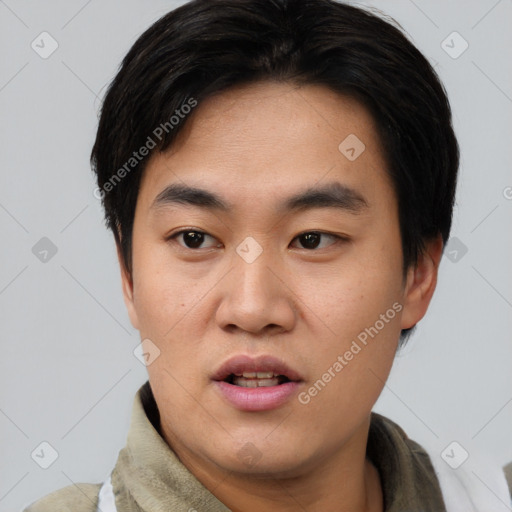 Neutral asian young-adult male with short  black hair and brown eyes