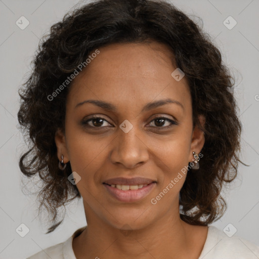 Joyful black young-adult female with medium  brown hair and brown eyes