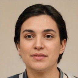 Joyful white young-adult female with medium  brown hair and brown eyes