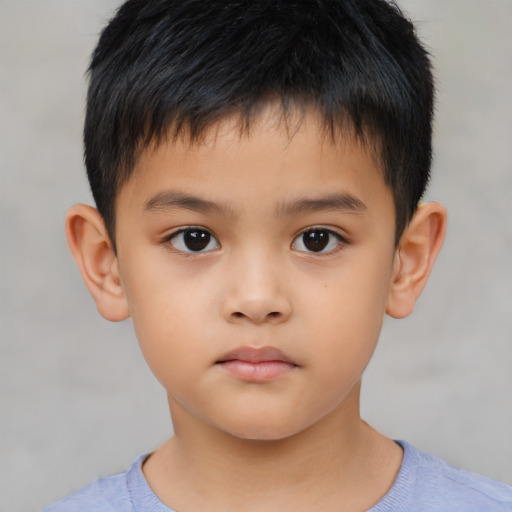 Neutral asian child male with short  brown hair and brown eyes
