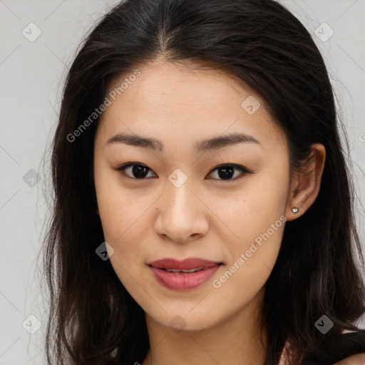 Joyful latino young-adult female with long  brown hair and brown eyes