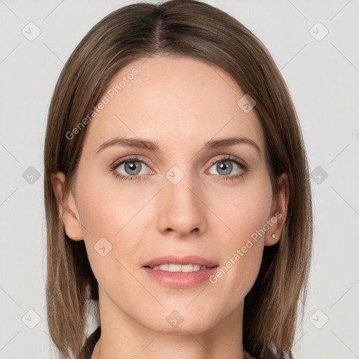 Joyful white young-adult female with long  brown hair and grey eyes