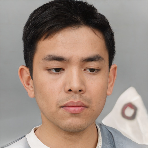Neutral asian young-adult male with short  brown hair and brown eyes