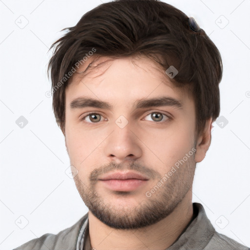 Neutral white young-adult male with short  brown hair and brown eyes