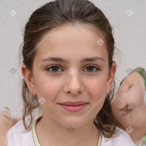 Joyful white child female with medium  brown hair and brown eyes