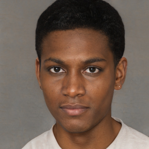 Neutral black young-adult male with short  black hair and brown eyes