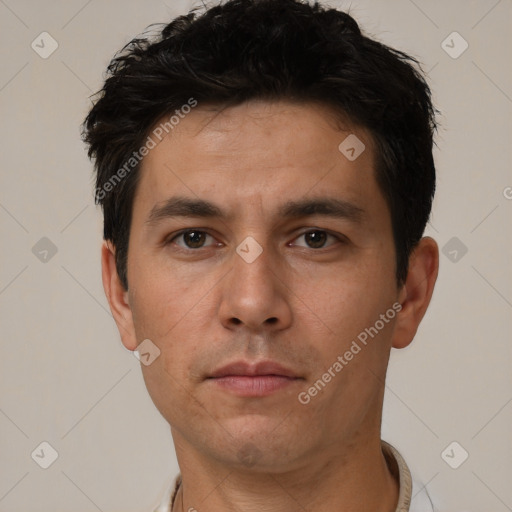 Neutral white adult male with short  black hair and brown eyes