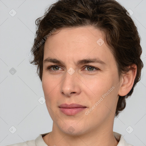 Joyful white young-adult male with medium  brown hair and brown eyes