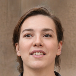 Joyful white young-adult female with medium  brown hair and brown eyes