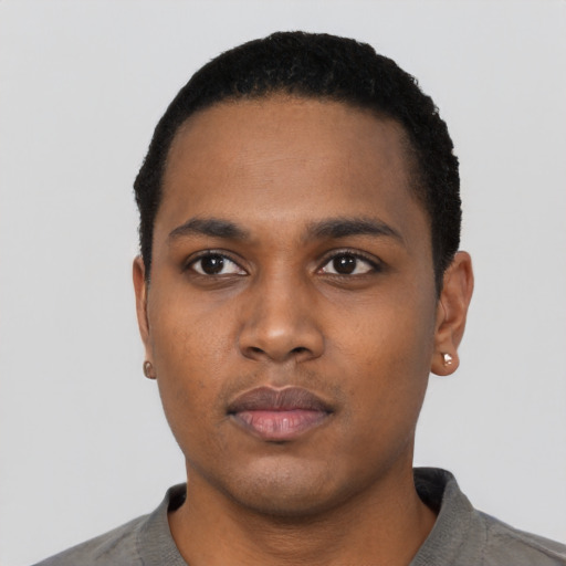 Neutral black young-adult male with short  black hair and brown eyes