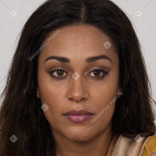 Joyful latino young-adult female with long  brown hair and brown eyes