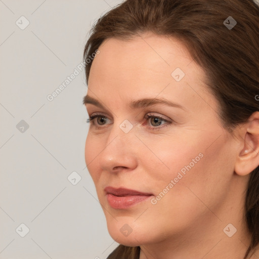 Neutral white young-adult female with medium  brown hair and brown eyes