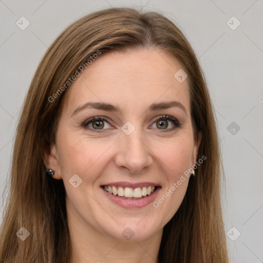 Joyful white young-adult female with long  brown hair and green eyes