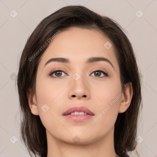 Neutral white young-adult female with medium  brown hair and brown eyes