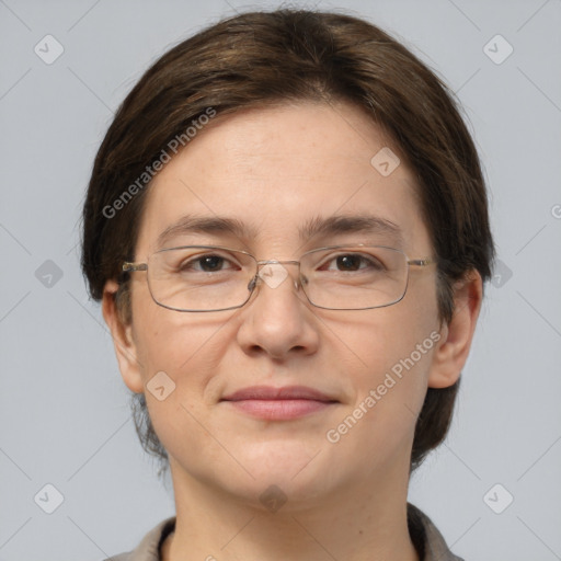 Joyful white adult female with medium  brown hair and grey eyes