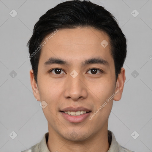 Joyful white young-adult male with short  black hair and brown eyes