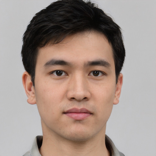 Neutral white young-adult male with short  black hair and brown eyes
