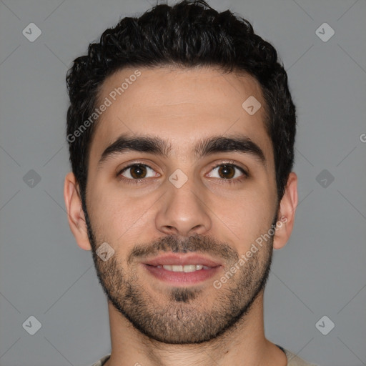 Joyful white young-adult male with short  black hair and brown eyes