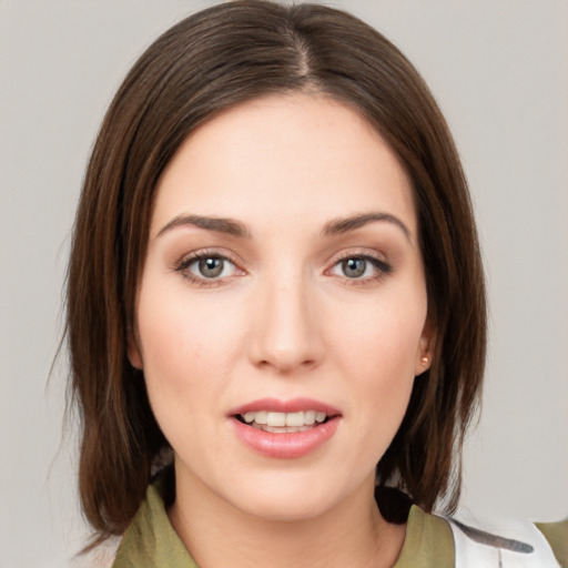 Neutral white young-adult female with medium  brown hair and green eyes