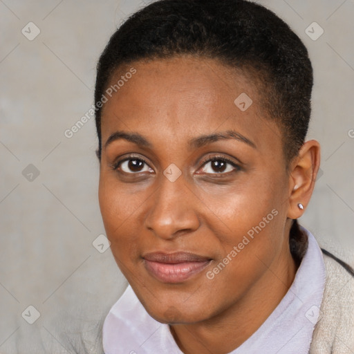 Joyful black young-adult female with short  brown hair and brown eyes