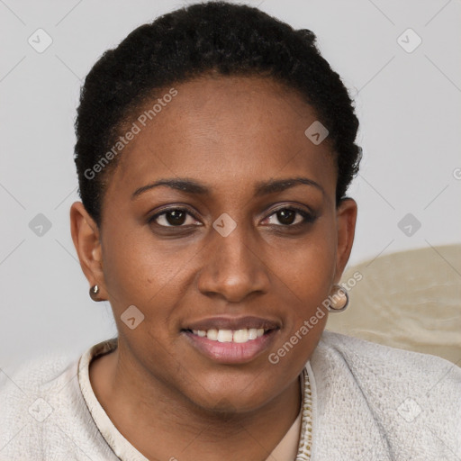 Joyful black young-adult female with short  brown hair and brown eyes