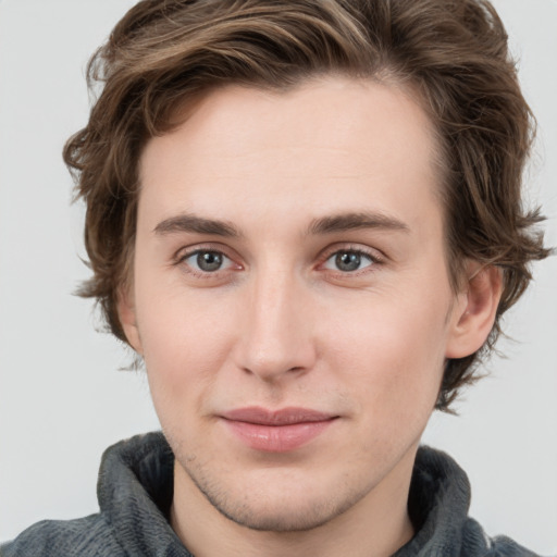 Joyful white young-adult male with medium  brown hair and brown eyes