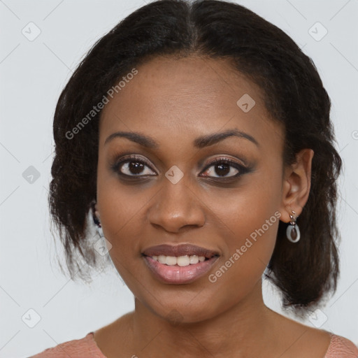 Joyful black young-adult female with medium  brown hair and brown eyes