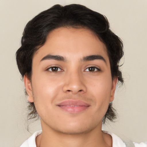 Joyful white young-adult male with medium  brown hair and brown eyes