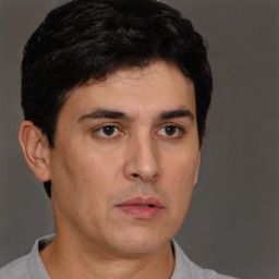 Neutral white adult male with short  brown hair and brown eyes