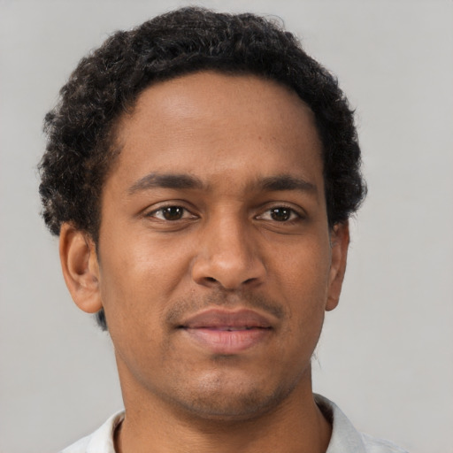 Neutral black young-adult male with short  brown hair and brown eyes