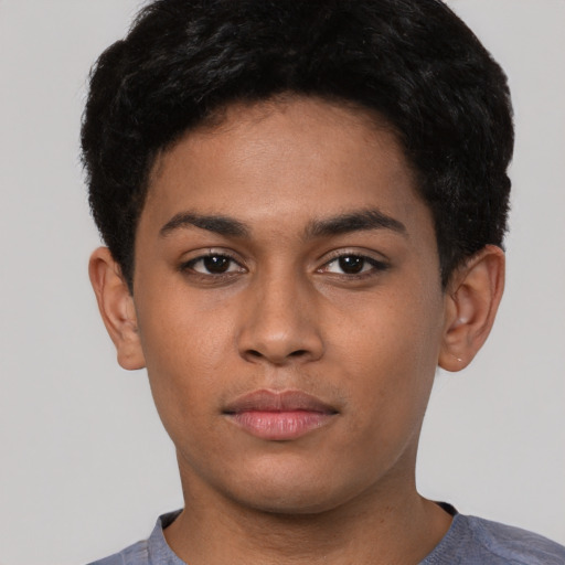 Neutral latino young-adult male with short  brown hair and brown eyes