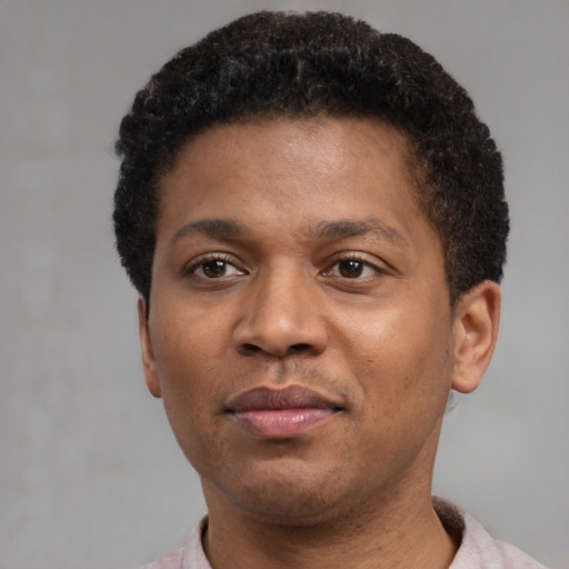 Neutral black young-adult male with short  black hair and brown eyes