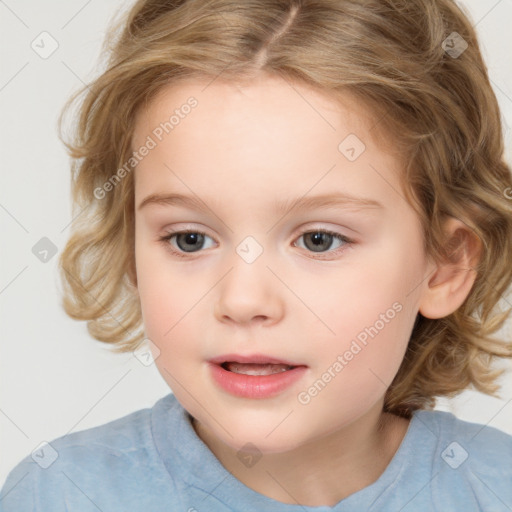 Joyful white child female with medium  brown hair and brown eyes