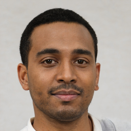 Neutral black young-adult male with short  black hair and brown eyes
