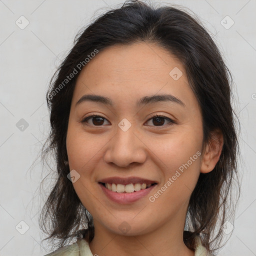 Joyful asian young-adult female with medium  brown hair and brown eyes