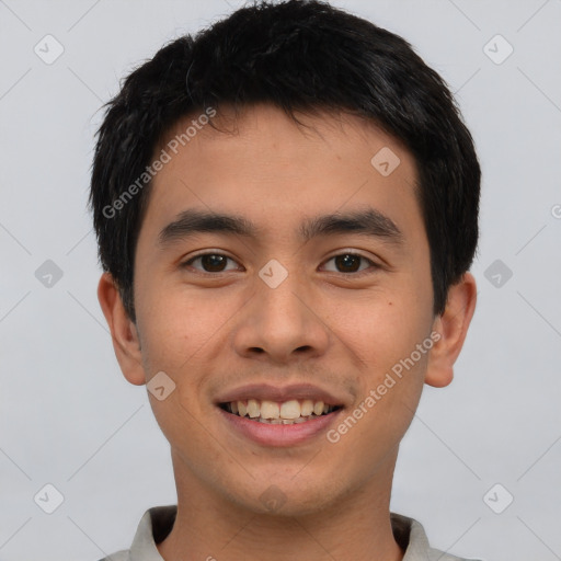 Joyful asian young-adult male with short  brown hair and brown eyes