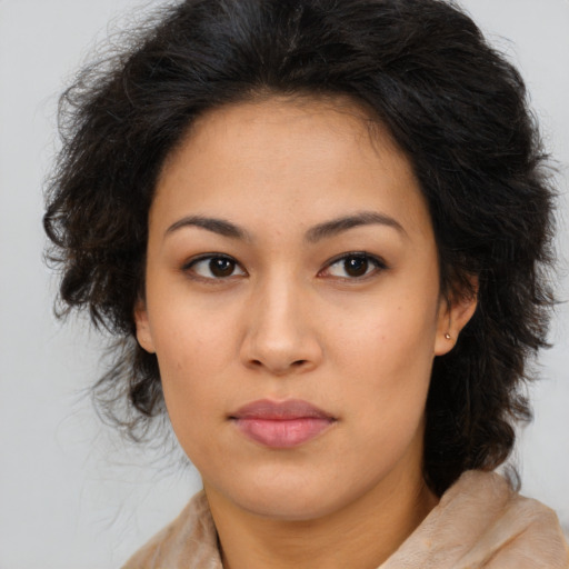 Neutral latino young-adult female with medium  brown hair and brown eyes