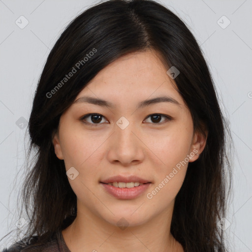 Joyful asian young-adult female with long  brown hair and brown eyes