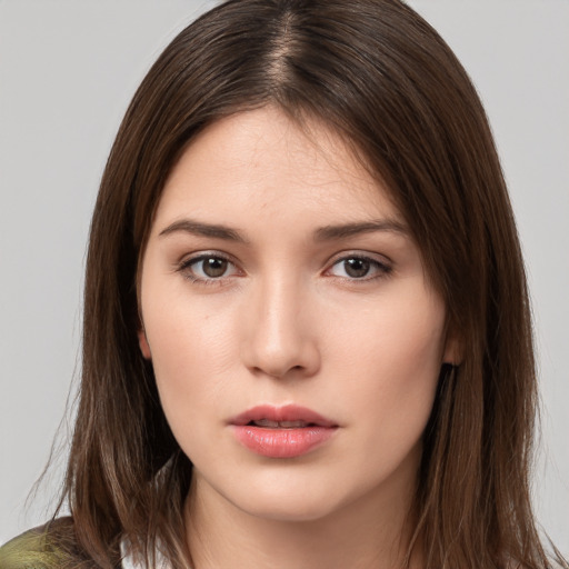 Neutral white young-adult female with medium  brown hair and brown eyes