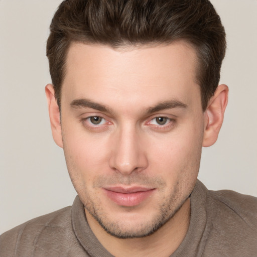 Neutral white young-adult male with short  brown hair and brown eyes